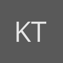 Kat Thompson avatar consisting of their initials in a circle with a dark grey background and light grey text.
