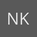 Natalie Kamajian avatar consisting of their initials in a circle with a dark grey background and light grey text.